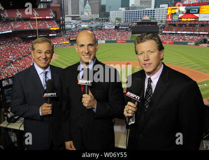 ESPN Television's Sunday Night Baseball broadcast team (L to R) Bobby Valentine, Dan Shulman  and Orel Hershiser pose for a photograph before a game between the Cincinnati Reds and the St. Louis Cardinals at Busch Stadium in St. Louis on April 24, 2011.   UPI/Bill Greenblatt Stock Photo