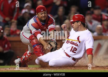 St. Louis Cardinals Lance Berkman embraces Albert Pujols after the