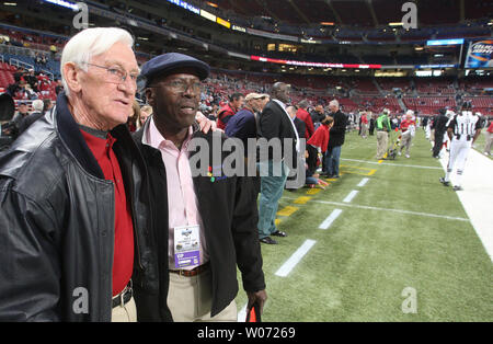 Former St. louis Football Cardinals players, Hall of Fame member Larry Wilson (L) and Mel Gray watch the Arizona Cardinals practice before a game against the St. louis Rams at the Edward Jones Dome in St. Louis on November 27, 2011. Many of the old St. louis Cardinals players met before the game for a annual reunion.     UPI/Bill Greenblatt Stock Photo