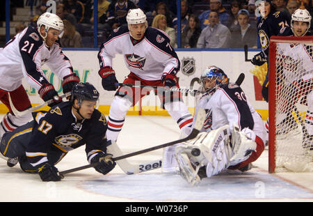 St. Louis Blues Vladimir Sobotka (17) watches as Columbus Blue Jackets Curtis Sanford kicks the puck clear in the first period at the Scottrade Center in St. Louis on March 10, 2012.    UPI/Bill Greenblatt Stock Photo