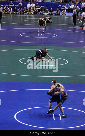 Wrestlers compete during day two of the NCAA Wrestling Championships at the Scottrade Center in St. Louis on March 16, 2012. Over 70 schools are competing in the three day championship series.   UPI/Bill Greenblatt Stock Photo