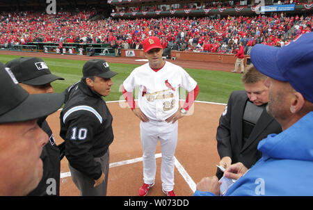 New St. Louis Cardinals manager Mike Matheny stands at homeplate with Chicago Cubs manager Dale Sveum to exchange lineup cards at Busch Stadium in St. Louis on April 13, 2012. The lineup exchange is Matheny's first at home as the new Cardinals manager.    UPI/Bill Greenblatt Stock Photo