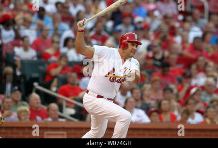 St. Louis Cardinals Lance Berkman swings hitting an RBI single in the first inning against the Los Angeles Dodgers at Busch Stadium in St. Louis on July 23, 2012.  UPI/Bill Greenblatt Stock Photo