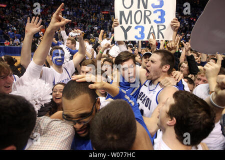 The Creighton Bluejays celebrate with their fans after winning the Missouri Valley Conference tournament defeating the Wichita State Shockers 68-65, at the Scottrade Center in St. Louis on March 10, 2013.    UPI/Bill Greenblatt Stock Photo