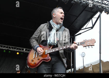 Barenaked Ladies lead vocalist Ed Robertson (C) bassist Jim Creeggan