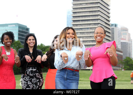 Talk show host Wendy Williams asks several women 'How you doing?' during the taping of promotional spots for their upcoming season, while in St. Louis on May 16, 2014. UPI/Bill Greenblatt Stock Photo