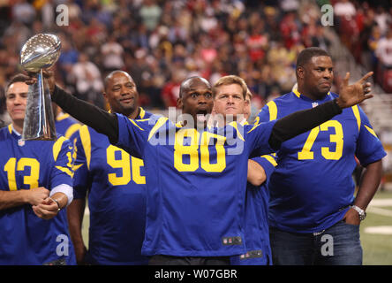 St. Louis Rams Marshall Faulk (L) congratulates Isaac Bruce after Bruce  scored a touchdown against the Seattle Seahawks in the first quarter at the  Edward Jones Dome in St. Louis on December