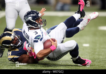 St. Louis Rams Robert Quinn sacks Seattle Seahawks quarterback Russell Wilson in the second quarter at the Edward Jones Dome in St. Louis on October 19, 2014.   UPI/Bill Greenblatt Stock Photo