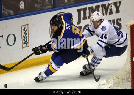 Toronto Maple Leafs' Morgan Rielly clears the puck away from goaltender ...