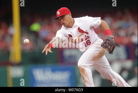 St. Louis Cardinals Kolten Wong flips the baseball to first base to get Minnesota Twins Kennys Vargas in the seventh inning at Busch Stadium in St. Louis on June 15, 2015.  St. Louis defeated Minnesota 3-2. Photo by Bill Greenblatt/UPI Stock Photo