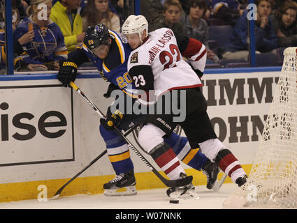 Arizona Coyotes Oliver Ekman-Larsson pushes St. Louis Blues Alexander Steen off of the puck in the first period at the Scottrade Center in St. Louis on December 8, 2015. Photo by Bill Greenblatt/UPI Stock Photo