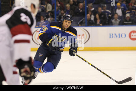 St. Louis Blues Ryan Reeves keeps an eye on Arizona Coyotes Oliver Ekman-Larsson of Sweden as he skates up ice in the first period at the Scottrade Center in St. Louis on December 8, 2015. Photo by Bill Greenblatt/UPI Stock Photo