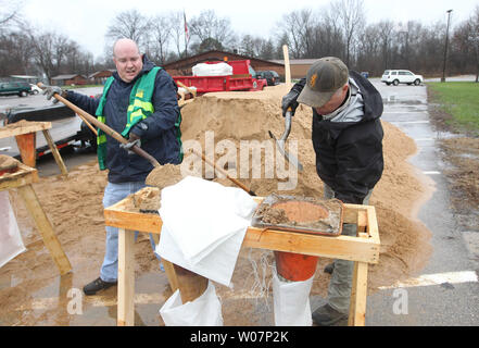 Volunteers fill sandbags as three days of steady rains have caused the Meramec River to rise to near record levels in Eureka, Missouri on December 28, 2015. Missouri Governor Jay Nixon has declared a state of emergency with over 125 roads flooded or closed and 10 deaths due to the flooding statewide. Photo by Bill Greenblatt/UPI Stock Photo