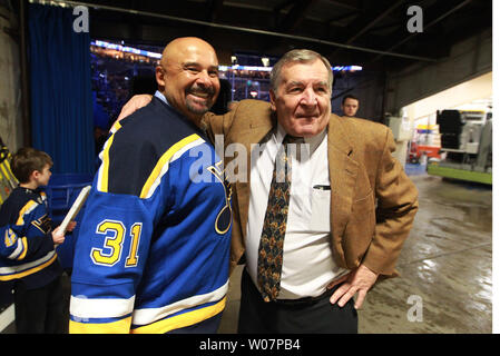 Former St. Louis Blues Captain Bob Plager waves to the crowd as he