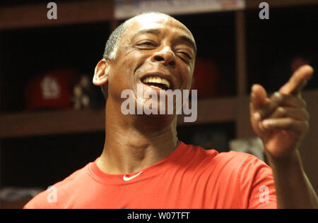 Former St. Louis Cardinals Willie McGee throws out the first pitch before Game 3 of the World ...