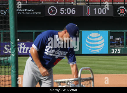 Los Angeles Dodgers coach Rob Flippo prepares to throw batting practice in 100 degree heat at Busch Stadium in St. Louis on July 24, 2016.   Photo by Bill Greenblatt/UPI Stock Photo