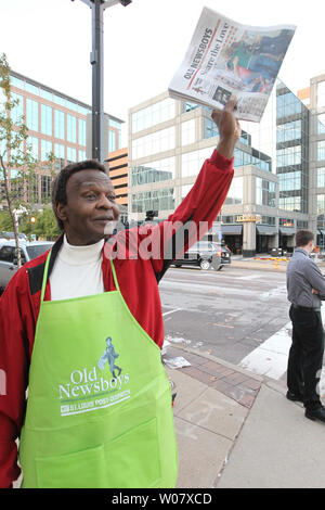 Former St. Louis Cardinals and member of the National Baseball Hall of Fame Lou Brock, stands on the street corner selling newspapers on Old Newsboys Day in Clayton, Missouri on November 17, 2016. Funds collected on Old Newsboys Day, goes to over 200 children's charities in the St. Louis area. Photo by Bill Greenblatt/UPI Stock Photo