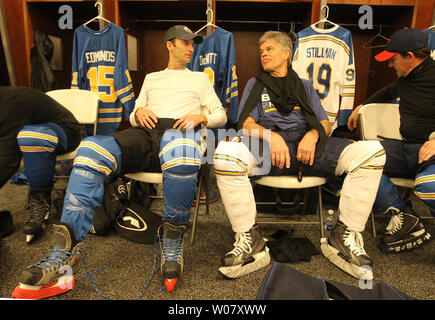 St. Louis Cardinals President Bill DeWitt III (L) and St. Louis Blues Chairman Tom Stillman, talk as they dress for a game between the St. Louis Cardinals alumni and St. Louis Blues alumni at Busch Stadium in St. Louis on January 8, 2017. Photo by Bill Greenblatt/UPI Stock Photo