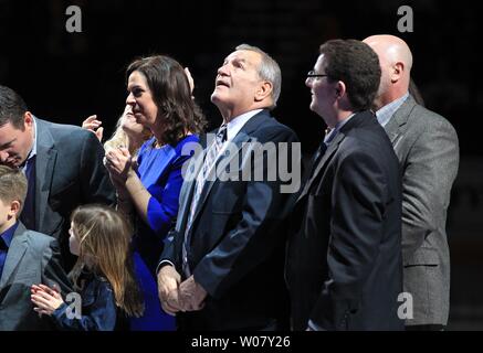 Former St. Louis Blues Bob Plager and family members watch as his number 5 is hoisted to the rafters during retirement ceremonies before a game against the Toronto Maple Leafs at the Scottrade Center in St. Louis on February 2, 2017.   Photo by Bill Greenblatt/UPI Stock Photo