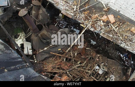 A photo of the roof of the Loy-Lange Box Company shows the damage of an explosion that killed three and critically injured four in St. Louis on April 3, 2017. Officials say a boiler exploded, killing one and the heat exchanger of the boiler was launched and crashed through the roof of Faultless Healthcare Linen, which is located about 500 feet away, killing two.  Photo by St. Louis Fire Department/UPI Stock Photo