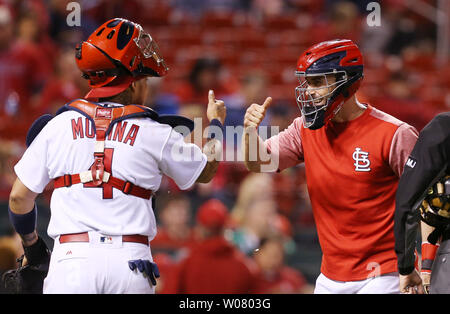 St. Louis Cardinals catchers Yadier Molina, left, and Brayan Pena talk ...