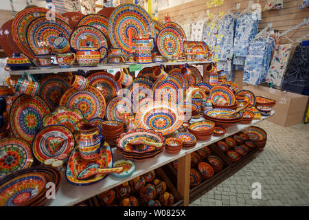Colorful traditional portuguese pottery in the shop. Stock Photo