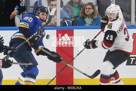 St. Louis Blues Alexander Steen and Arizona Coyotes Oliver Ekman-Larsson of Sweden try to bat down puck during the third period at the Scottrade Center in St. Louis on November 9, 2017.   Photo by Bill Greenblatt/UPI Stock Photo