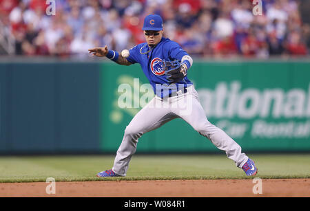 Chicago Cubs Addison Russell makes a catch on a pop up off the bat of St.  Louis Cardinals Magneuris Sierra while Javier Baez waits as a backup in the  sixth inning at