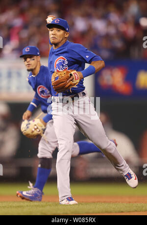 Chicago Cubs Addison Russell makes a catch on a pop up off the bat of St.  Louis Cardinals Magneuris Sierra while Javier Baez waits as a backup in the  sixth inning at