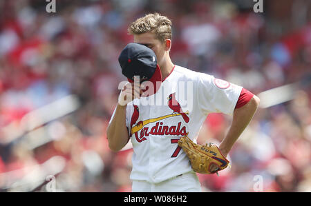 Cincinnati Reds pitcher Luke Weaver looks out of the dugout during the ...