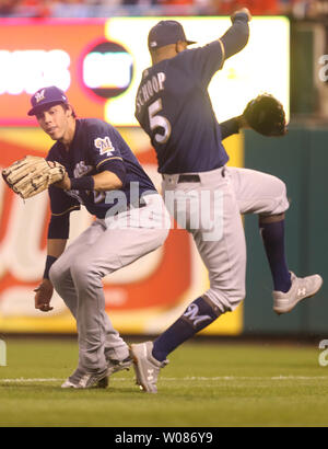 Milwaukee Brewers' Christian Yelich, right, slides in safely past the ...