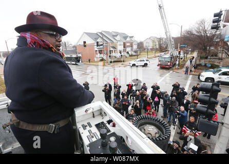 Cedric Antonio Kyles, better known by his stage name, Cedric the Entertainer, surveys the crowd from a St. Louis Fire Department Hook and Ladder truck as he prepares to unveil a sign bearing his name in St. Louis on December 15, 2018. The street has been renamed 'Cedric The Entertainer Way'. Kyles went to high school in the area and spent many of his formative years performing in St. Louis.   Photo by Bill Greenblatt/UPI Stock Photo