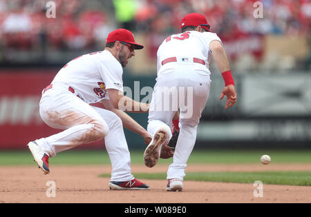 St. Louis Cardinals shortstop Paul DeJong (L) and third baseman Matt Carpenter collide as they both go for a ball off the bat of Philadelphia Phillies Maikel Franco in the fifth inning at Busch Stadium in St. Louis on May 8, 2019. Philadelphia defeated St. Louis 5-0. Photo by Bill Greenblatt/UPI Stock Photo