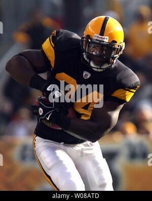 The Baltimore Ravens' Michael Oher walks dejectedly off the field after a  last minute interception by teammate Tom Zbikowski against the Pittsburgh  Steelers was disallowed. The Steelers defeated the Ravens, 23-20, at