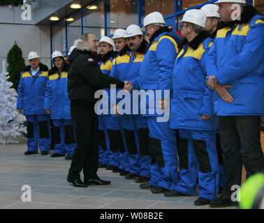 Russian President Vladimir Putin greets employees at the newly opened alpine ski center for the 2014 Olympics at Krasnaya Polyana in the southern Russian Black Sea resort of Sochi on January 2, 2008. (UPI Photo/Anatoli Zhdanov) Stock Photo