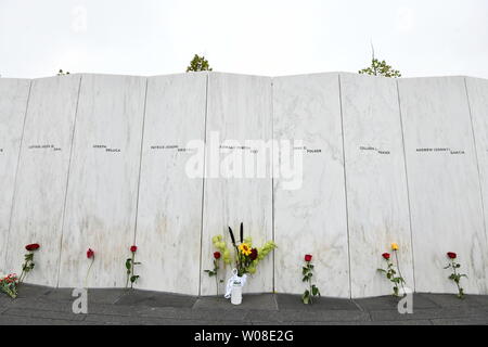 Flowers left by family members lie by the 'Wall of Names' at the Flight 93 National Memorial, on the 17th anniversary of 9/11 in Shanksville, Pennsylvania on Tuesday, September 11, 2018. Flight 93 crashed during the September 11, 2001 terrorist attacks.         Photo by Pat Benic/UPI Stock Photo