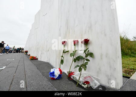 Flowers left by family members lie by the 'Wall of Names' at the Flight 93 National Memorial, on the 17th anniversary of 9/11 in Shanksville, Pennsylvania on Tuesday, September 11, 2018. Flight 93 crashed during the September 11, 2001 terrorist attacks.         Photo by Pat Benic/UPI Stock Photo