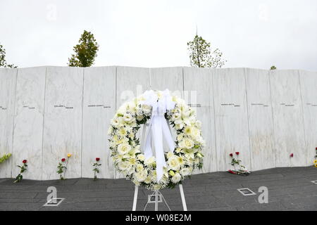 Flowers and a wreath left by family members lie by the 'Wall of Names' at the Flight 93 National Memorial, on the 17th anniversary of 9/11 in Shanksville, Pennsylvania on Tuesday, September 11, 2018. Flight 93 crashed during the September 11, 2001 terrorist attacks.         Photo by Pat Benic/UPI Stock Photo