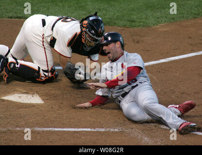 St. Louis Cardinals Jim Edmonds watches his two run home run leave