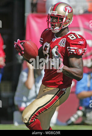 San Francisco 49ers Antonio Bryant (81) tries to fend off San