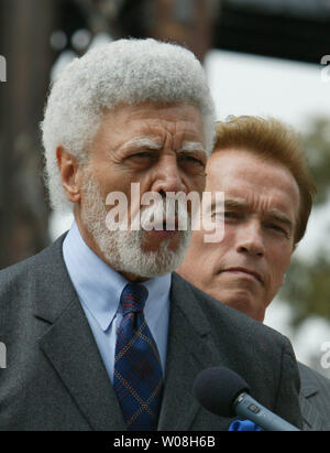 Oakland Mayor Ron Dellums (L), backed by California Governor Arnold Schwarzenegger speaks at a ceremony for the reopening of Interstate 580 East  in Oakland, California on May 25, 2007. A section was destroyed 4/29/07 when a tanker truck exploded and the freeway collapsed.  (UPI Photo/Terry Schmitt) Stock Photo