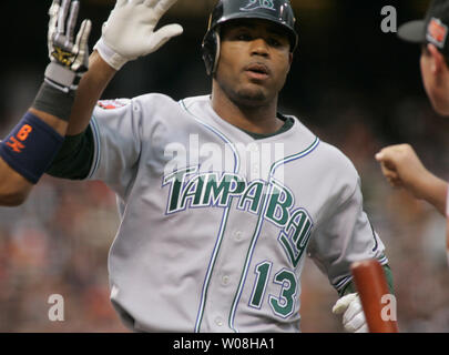 Tampa Bay Devil Rays' Carl Crawford warms up in the on-deck circle