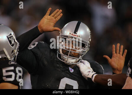 Oakland Raiders Ronald Curry, #89, celebrates his 41 yard touchdown with  Jerry Porter in the 2nd quarter of the game against the Cleveland Browns at  McAfee Coliseum in Oakland, Calif., Sunday, September