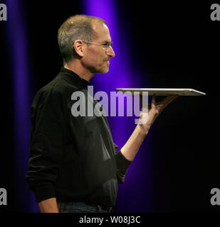 Apple Inc. CEO Steve Jobs unveils the MacBook Air, the world's thinnest notebook, during his keynote address at Macworld in San Francisco on January 15, 2008.  (UPI Photo/Terry Schmitt) Stock Photo