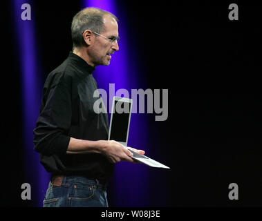 Apple Inc. CEO Steve Jobs unveils the MacBook Air, the world's thinnest notebook, during his keynote address at Macworld in San Francisco on January 15, 2008.  (UPI Photo/Terry Schmitt) Stock Photo