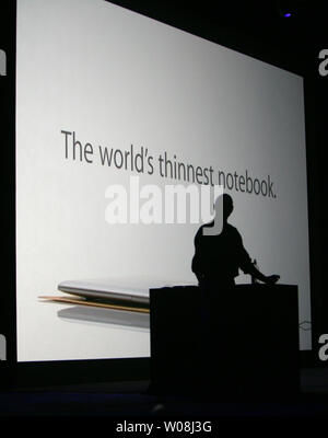 Apple Inc. CEO Steve Jobs unveils the MacBook Air, the world's thinnest notebook, during his keynote address at Macworld in San Francisco on January 15, 2008.  (UPI Photo/Terry Schmitt) Stock Photo