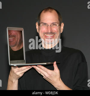 Apple Inc. CEO Steve Jobs unveils the MacBook Air, the world's thinnest notebook, during his keynote address at Macworld in San Francisco on January 15, 2008.  (UPI Photo/Terry Schmitt) Stock Photo