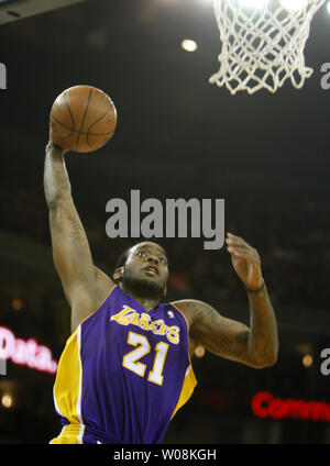 Los Angeles Lakers Josh Powell goes up for a jam against the Golden State Warriors in the first half at Oracle Arena in Oakland, California on January 7, 2009. (UPI Photo/ Terry Schmitt) Stock Photo