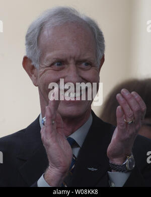 Hero pilot Captin Chesley 'Sully' Sullenberber III applauds at a celebration in his honor in Danville, California on January 24, 2009. Sullenberger landed US Airways Flight 1549 in the Hudson river saving all aboard.     (UPI Photo/ Terry Schmitt) Stock Photo