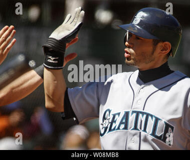 Seattle Mariners, from left, Dan Wilson, Ichiro Suzuki, Raul